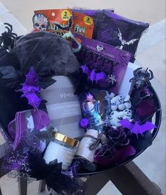 a basket filled with lots of halloween items