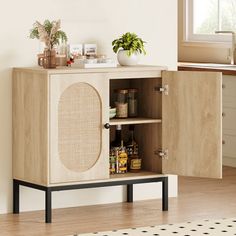 an open cabinet in the corner of a room with a potted plant on top