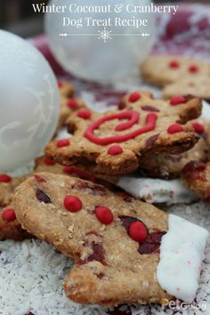 cookies and marshmallows are on top of white rice with red candies