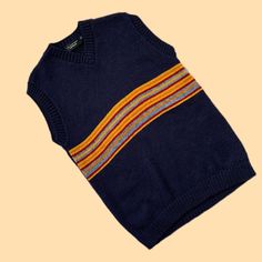 Vintage Y2K 00's Unisex Navy Blue Yellow Striped Dark Academia Preppy Skater Knit Sweater Vest Size M/L Condition: 9/10 Size: feels like M/L Model is size UK6-8/EU34/S and is 164 cm tall (5.4ft) The item is preloved/vintage so some signs of natural wear and age might appear ✨ Casual Multicolor Sweater Vest For Winter, Blue Knit Vest For Fall, Navy Wool Tops For Fall, Navy Wool Winter Tops, Winter Crew Neck Knitted Vest, Fitted Blue Sweater Vest For Winter, Blue Knitted Wool Tops, Knitted Crew Neck Winter Vest, Winter Knitted Crew Neck Vest