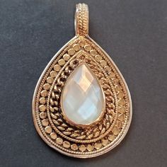 Like New!!! Anna Beck / Large Multifaceted Moonstone Teardrop Pendant Necklace Absolutely Gorgeous Excellent Pre-Owned Condition Sterling Silver/18k Gold Plate Handcrafted Bali Stamped Anna Beck 925 - Large Multifaceted Moonstone Pendant - Approximately 1-1/2" X 1" - 18k Gold Over 925 Sterling Anna Beck Jewelry, Anna Beck, Teardrop Pendant, Moonstone Pendant, Beck, Womens Jewelry Necklace, Moonstone, Bali, 18k Gold