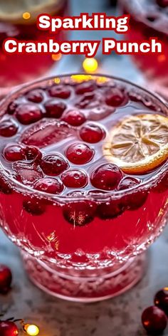 a glass bowl filled with cranberry punch