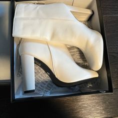 These White Boots Are So Adorable! They Are A Size 9. Style Name Is Habibi. Perfect For Fall And Winter! These Were Only Tried On, Never Worn. They Unfortunately Don’t Fit Me! Bought From A Boutique. Super Cute And Original!!! Chic White Boots With Wide Calf, Chic White Wide Calf Boots, White Mid-calf Boots With Stacked Heel For Spring, White High Heel Mid-calf Trendy Boots, White High Heel Mid-calf Boots, White Block Heel Mid-calf Boots For Spring, White Pointed Toe Platform Boots In Faux Leather, White Platform Boots With Square Toe For Winter, Trendy Ankle Boot Heels With Padded Heel