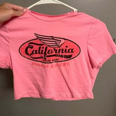 Pink California Crop. Never Worn Vision Board Outfits, 2000 Style, E Girl Fashion, Sublimation Ideas Projects, Crop Top Y2k, Sublimation Ideas Projects Inspiration, Sock Outfits, Graphic Crop Top, Suede Fringe Jacket