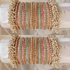 two rows of bracelets with pearls on them