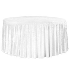 a white table cloth on top of a round table