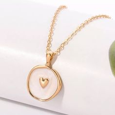 White & Gold Plated Heart Pendant Necklace Chain Has A Lobster Claw Hook Closure Brand New! Trendy White Heart Necklace With Clavicle Chain, Trendy White Heart Necklace With Chain, White Open Heart Jewelry With Heart Beads, Trendy White Heart Necklace With Adjustable Chain, White Minimalist Jewelry With Heart Charm, Minimalist White Heart Charm Jewelry, Trendy White Double Heart Jewelry, White Double Heart Clavicle Chain Necklace, Trendy White Necklace For Valentine's Day