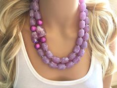 "A classic color that never goes out of style! Lavender / light purple beaded necklace and earring set. Necklace is 16 inches long with a 4 inch extender chain. Earrings are 2\" drop, a matching lavender bead with a fish hook style hardware. Thank you for supporting handmade and small American business! Hate to wait? Me too! I ship 6 days a week. Like this style but prefer another color? Check out our other BIG BEAD necklaces: https://www.etsy.com/shop/PolkaDotDrawer?ref=hdr_shop_menu&search Lavender Round Beads Jewelry For Wedding, Lavender Round Beads Wedding Jewelry, Lavender Round Bead Wedding Jewelry, Purple Large Beaded Necklace, Lavender Round Beads Jewelry For Party, Purple Single Strand Beaded Necklace, Lavender Beaded Jewelry For Wedding, Purple Large Beads Jewelry Gift, Purple Large Beads Jewelry For Gift