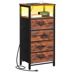 a tall wooden chest with drawers and a light on it's top, in front of a white background