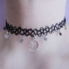 This Moon And Star Tattoo Choker Necklace Is A Wonderful Addition To Your Wardrobe And Your Style! This Fun And Unique Piece Is Sure To Get A Lot Of Compliments! Silver Star-shaped Choker For Party, Black Moon Charm Jewelry For Party, Black Jewelry With Moon Charm For Party, Gothic Black Star Necklace, Black Gothic Star Necklace, Black Star Charm Choker Necklace, Trendy Black Star-shaped Jewelry, Black Moon Charm Jewelry For Festivals, Black Star Charm Choker Jewelry