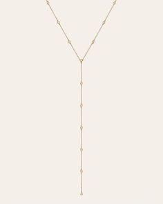 14k solid gold lariat with approx. 13 bezel diamonds, beautifully handcrafted, on a dainty gold cable link chain with a 5'' chain drop. An edgy, fun yet timeless necklace, wear it by itself or layered. Length: 16"-18" Diamond Carat Weight : Approx. 0.32ctw Diamond Clarity: VS Ships in 5-7 business days Rush orders ship in 3-5 business days Comes in a custom Zoe Lev jewelry box. *Eligible for return, per our policy. See here for details. Yellow Gold Lariat Backdrop Necklace With Adjustable Chain, Yellow Gold Dangle Backdrop Necklace With Adjustable Chain, Adjustable Yellow Gold Backdrop Necklace With Delicate Chain, Yellow Gold Backdrop Necklace With Delicate Long Drop Chain, Yellow Gold Backdrop Necklace With Delicate Chain, Dainty Yellow Gold Backdrop Necklace With Long Drop, Gold Dainty Long Drop Backdrop Necklace, Gold Long Drop Dainty Backdrop Necklace, Dainty Gold Long Drop Backdrop Necklace