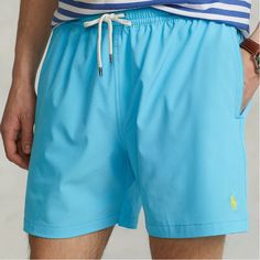 These Polo Ralph Lauren Shorts Are New With Tags! Size: Xxl Color: Blaze Blue Elasticized Waist With Drawstring Side On-Seam Pockets, Back Right Buttoned Pocket Signature Embroidered Pony At The Left Hem Woven "Polo Ralph Lauren Swimwear" Label At The Back Pocket Mesh Brief For Additional Support Shell: Polyester/Elastane; Brief: Polyester Machine Wash Blue Poolside Shorts With Elastic Waistband, Blue Shorts With Elastic Waistband For Poolside, Blue Short Leg Swim Trunks For Beach, Blue Swim Trunks For Summer With Short Inseam, Blue Swimwear With Short Inseam For Summer, Casual Plain Shorts For Pool, Casual Pool Shorts, Blue Swim Trunks With Built-in Shorts In Relaxed Fit, Blue Short Swim Trunks With Elastic Waistband