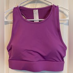 Nwt Fabletics Trinity High Impact Sports Bra Size S /6 Color: Bright Fig / Multi I Love These For Running With My Phone Stock Photo Shown For Fit Only Product Description We Turned Our Best-Selling Trinity Pocket Legging Into An Oh-So-Cute Bra For The First Time Ever! Naturally, We Crafted This High-Impact Style With The Same Innovative Triple-Pocket Designso You Can Keep Essentials Handy At Your Next Workout. Features Moisture-Wicking Breathable 4-Way Stretch Removable Bra Cups Pockets Fabric K Sporty Purple Sports Bra With Built-in Bra, Purple Sleeveless Activewear For Gym, Functional Purple Racerback Activewear, Casual Purple Activewear For Training, Purple Activewear With Built-in Bra For Light Exercise, Purple Go-dry Activewear For Training, Stretch Purple Activewear For Yoga, Purple Racerback Top For Gym, Purple Breathable Yoga Activewear