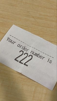 a piece of paper that says your order number is 22