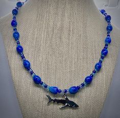 Dun Dun...Dun Dun... Cute glass bead necklace for the shark fanatic. Length: 19.5 inches No returns. Please contact me with any issues. Bead Shark, Shark Necklace, The Shark, Glass Bead Necklace, Beaded Necklaces, Glass Bead, Bead Necklace, Necklace Etsy, Beauty Book