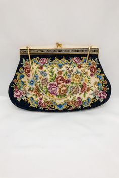 ❁ Stunning Vintage (around 1940's ) Tapestry (carpet) Handbag or Evening Bag. ❁ It is a tapestry style bag with a "snake" chain handle - and a gold-tone clasp closure, as photographed.  ❁ Beautiful vintage roses floral tapestry embroidered needlepoint evening bag same pattern both sides and pattern around trim brass frame has texture pattern to it ❁ Measurements taken at widest points  25 cm. x 16 cm. ❁ In excellent condition inside and out,  A lovely example - which looks like it has been store Vintage Tapestry Bag For Evening, Vintage Evening Bag In Tapestry Material, Formal Embroidered Tapestry Bag, Antique Tapestry Evening Bag, Evening Tapestry Rectangular Shoulder Bag, Handmade Tapestry Evening Bags, Evening Rectangular Tapestry Shoulder Bag, Handmade Tapestry Bags For Evening, Vintage Embroidered Rectangular Clutch