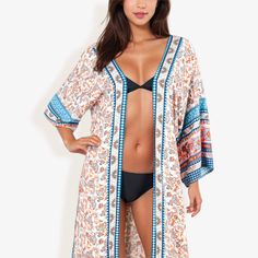 The Anna-Kaci Women's Bohemian Long DusterCover-Up with Floral Paisley Print and Wide Sleeves is a stunning and versatile addition to your wardrobe. Crafted from lightweight, breathable fabric, this Dusterfeatures a beautiful floral paisley print that exudes bohemian charm and elegance. The long, flowing design and wide sleeves provide a relaxed and comfortable fit, perfect for layering over swimsuits, dresses, or casual outfits. Ideal for beach days, poolside lounging, or adding a chic touch to Bohemian Printed Open Front Tops, Bohemian Open Front Printed Tops, White Paisley Print Top For Beach, Bohemian Paisley Print Beach Tops, Blue Paisley Print Beach Top, Beach Blue Tops With Paisley Print, Bohemian Blue Open Front Top, Flow Design, Crochet Cover Up