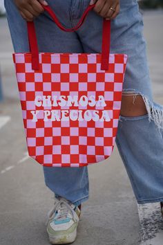 A spacious and trendy tote bag to help you carry around everything that matters. * 100% spun polyester fabric * Bag size: 15″ × 15″  * Capacity: 2.6 US gal  * Maximum weight limit: 44lbs (20 kg) * Dual handles made from 100% natural cotton bull denim * Handle length 11.8″ * The handles can slightly differ depending on the fulfillment location This product is made especially for you as soon as you place an order, which is why it takes us a bit longer to deliver it to you. Making products on deman Red Satchel Canvas Bag For Shopping, Red Canvas Satchel For Shopping, Red Canvas Bag With Removable Pouch And Double Handle, Red Square Canvas Bag With Large Capacity, Large Capacity Red Square Canvas Bag, Red Bucket Bag With Top Carry Handle, Red Bucket Bag With Top Carry Handle For Shopping, Red Double Handle Bucket Bag With Top Carry, Red Tote Bucket Bag With Top Carry Handle