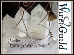 an advertisement for vortex earrings with a twist