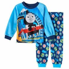 THOMAS THE TANK ENGINE **2 PIECE LONG SLEEVE PAJAMA SET** **SIZE 3T** This listing is for one brand new Thomas the Tank Engine 2 piece pajama set.   This is so cute in a beautiful 'Thomas Blue' with pictures of Thomas on the top and train symbols all over the bottoms!  This is great for all seasons as they are 100% polyester, so soft and flame resistant.  Brand New with Tags....an awesome gift to keep your little engineer warm and cozy all year round!! CHECK OUT MY OTHER AUCTIONS AND EBAY STORE Clubbing Shoes, Pajamas Robe, Toddler Top, Plus Size Sleepwear, Matching Pjs, Thomas The Tank, Altering Clothes, Thomas The Tank Engine, Fleece Pajamas