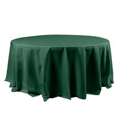 a round table covered in green cloth