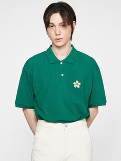 Editor's NotesThis essential polo shirt is simply accented with a dense embroidery of signature flower motif and easily goes with any bottoms. It's cut from soft touch cotton and poly-blend pique.- Polo collar- Half placket with button fastenings- Graphic embroidery on the chest- Drop shoulder- Short sleeves- Relaxed fit- Unisex wear- Minimize distortion after washingMeasurements (in.)S / M / L- Total Length: 28.0 in. / 29.5 in. / 31.1 in.- Shoulder: 19.3 in. / 20.5 in. / 21.3 in.- Chest: 20.9 in. / 22.0 in. / 22.8 in.- Sleeve Length: 8.3 in. / 8.7 in. / 9.1 in.Model Info:- Man: 5' 10.1, 143.3 lbs / Fitting size L- Woman: 5' 5, 112.4 lbs / Fitting size SComposition & Care- 80% Cotton, 20% Polyester (20's)- Recommend separate wash at low temperature water using neutral detergent or dry Green Relaxed Fit Polo Shirt, Green Cotton Polo Shirt With Collared Neckline, Casual Embroidered Cotton Polo Shirt, Casual Cotton Embroidered Polo Shirt, Spring Cotton Polo Shirt With Collared Neckline, Spring Collared T-shirt, Classic Green Polo Shirt For Spring, Green Casual Polo Shirt For Spring, Spring Polo Collar T-shirt