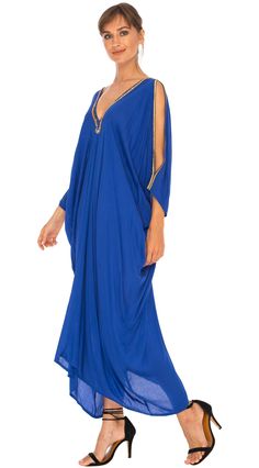 Feeling sexy has never been so easy. Simply toss on this long kaftan dress and wear out for many occasions. Don't forget to pack it on your next beach vacation. It is lightweight with cold shoulder sleeves. Delicate hand sewed gold beading along the deep V neckline. Get your flirt on! Semi-sheer Hand Sewed gold beading Made from lightweight rayon Hand wash cold, hang to dry Embellished V-neck Maxi Dress For Beach, Long Sleeve Beachwear Kaftan For Party, Elegant V-neck Festival Kaftan, Embellished Long Sleeve Kaftan For The Beach, Long Sleeve Embellished Kaftan For Beach, Beach Long Sleeve Embellished Kaftan, Embellished V-neck Kaftan For The Beach, Summer Festival V-neck Thobe, Summer Festival Thobe With V-neck