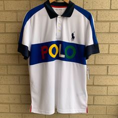 Polo Ralph Lauren Sport 2 Big Pony Tech Pique Rainbow Polo Logo Shirt - White/Blue. Men's Size Large. Brand New With Tags. Authentic Polo Ralph Lauren Item Will Be Packed Securely & Shipped Quickly. Please Let Me Know If You Have Any Questions! "Polo" Rubber-Printed At The Center Front Signature Embroidered Pony At The Left Chest Excellent Uv Protection: Upf 50+ Machine Washable Large Shoulder: 19.25 Inches Armpit To Armpit: 23 Inches Sleeves: 8.75 Inches Body Length: 27.5 Inches White Color Block Collared Tops, White Collared Color Block Top, Sporty Color Block Cotton Polo Shirt, White Color Block Short Sleeve Polo Shirt, White Color Block Cotton Polo Shirt, Blue Color Block Polo Shirt, White Color Block Polo Shirt, White Color Block Short Sleeve Shirt, White Casual Color Block Shirt