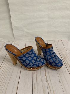 Coach Bacall Women Size 6.5 B Blue Platform Wooden High Heel Studded Clogs Shoes. Condition is "Pre-owned". Excellent Condition. Tried on in store one time. Retired shoe. Rare. Shipped with USPS Priority Mail. Casual Blue Platform Clogs, Blue Clogs With Platform And Round Toe, Blue Clogs With Wooden Heel And Round Toe, Blue Spring Mules With Wooden Heel, Blue Mules With Wooden Heel For Spring, Blue Platform Slip-on Clogs, Blue Slip-on Clogs With Wooden Heel, Casual Blue Clogs With Wooden Heel, Blue Slip-on Mules With Wooden Heel