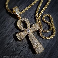 Shop Our Flawless Selection Of Iced Out Hip Hop Jewelry! This Micro Pave Set Ankh Necklace Is Truly One Of A Kind With Micro Stones And Baguettes Set The Summer Trend In Advance! We Use Multiple Layers Of Gold Plating On This Piece To Give An Authentic Look And Feel! Various Sizes Available 14k Gold Plating Micro Pave Stone Setting 2.5" Pendant Related Items: 10k 14k 18k 24k Gold Sterling Silver Diamond Gold Plated Bling Jewelry Fashion Birthday Gift Idea Men's Jewelry Women's Jewelry Trending W Nail Cross Necklace, Metal Bead Bracelet, Fashion Birthday, Lightning Bolt Necklace, Womens Jewelry Trends, Ankh Necklace, Diamond Cluster Earrings, Diamond Cross Necklaces, Brown Leather Bracelet