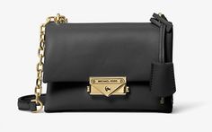 Evening Flap Bag With Palladium Hardware, Elegant Travel Shoulder Bag With Lock, Elegant Crossbody Bag With Lock, Chic Luxury Everyday Bag With Flap, Modern Formal Shoulder Bag With Lock, Modern Travel Shoulder Bag With Lock, Chic Evening Shoulder Bag With Lock, Chic Shoulder Bag With Flap And Palladium Hardware, Modern Evening Shoulder Bag With Lock