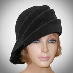 This beautiful ladies cloche is made from velour fur felt, and hand draped over an antique hat block. Hand finished with authentic millinery techniques.  Please indicate your head size measurement when ordering (measure your head horizontally just above your eyebrows). When you receive your hat, there will be a small ribbon inside to fine-tune the fit, and a hat box for safe storage. Note: Colors will vary depending on your monitor and there will also be some variations due to dye lots. I person Luxury Formal Cloche Hat, Elegant Cloche Hat With Short Brim In Fur Felt, Elegant Fur Felt Cloche Hat For Formal Occasions, Classic Cloche Felt Hat For Evening, Elegant Fur Felt Cloche Hat, Evening Wool Cloche Hat With Curved Brim, Wool Cloche Hat With Curved Brim For Evening, Wool Cloche Hat For Evening, Fitted Cloche Hat For Evening