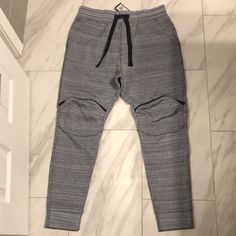 Men’s G-Star Raw 5620 Knee Zip Tapered Fit Sweatpants Price Is Firm At $150. Color: Gray/Black Condition: 10/10 New W Tags Urban Gray Sweatpants With Pockets, Urban Style Gray Winter Bottoms, Urban Gray Winter Bottoms, Urban Gray Sports Bottoms, Gray Urban Sport Bottoms, Urban Gray Bottoms For Sports, Sporty Gray Bottoms With Hip Pockets, Sporty Gray Tapered Leg Pants, Fitted Gray Joggers With Pockets