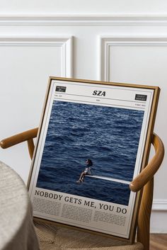 a newspaper sitting on top of a wooden chair