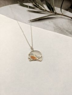 Robins appear when loved ones are near, not just for Christmas these beautiful birds are said to appear close by to represent a lost loved one, this simplified robin bird is perched on its own little branch, each one different, made from silver with a copper breast on a simple silver 18 inch chain as standard, 16 inch is available on request in the variations section. Silver Jewelry With Bird Design, Elegant Sterling Silver Necklace With Bird Design, Silver Sterling Silver Necklace With Bird Design, Sterling Silver Necklace With Bird Design, Robin Necklace, Sterling Silver Bird Necklace, Silver Bird Design Pendant Necklace, Sterling Silver Bird Pendant Jewelry, Handmade Sterling Silver Bird-shaped Jewelry