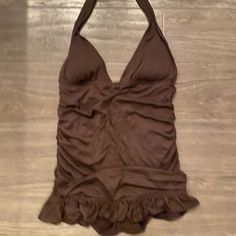 Brown Halter One Piece Swimsuit With Attached Mini Skirt, Full Coverage, Padded Bra, No Wires Like Brand New!!! Only Worn 1 Time Fitted One-piece Halter Top For Poolside, Fitted One-piece Halter Top For Summer, Fitted One-piece Lined Halter Top, Chic Fitted One-piece Halter Top, Summer Fitted Halter Top For Night Out, Chic Fitted Halter Neck Tankini, Lined One-piece Party Tankini, Solid Fitted Tankini For Party, Solid Color Fitted Tankini For Party