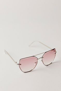 Just as effortless as they are essential, these so cool sunglasses are featured in an oversized, aviator silhouette with unique angle detailing, defined bar brow, and tinted lenses for added dimension. * Aviator style * Oversized silhouette * Defined brow bar * Adjustable nose pads * Gripped ends | Paloma Oversized Aviator Sunglasses by Free People in Pink Trendy Metal Frame Cat Eye Sunglasses For Spring, Chic Rimless Aviator Sunglasses For Summer, Modern Metal Frame Sunglasses For Spring, Modern Aviator Sunglasses For Spring, Trendy Shield Sunglasses With Metal Frame For Spring, Trendy Spring Shield Sunglasses With Metal Frame, Trendy Metal Frame Sunglasses For Spring, Modern Aviator Sunglasses With Gradient Lenses For Spring, Modern Pink Aviator Sunglasses For Spring