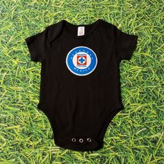 Club Cruz Azul Cotton Onesie Black Cotton Onesie For Summer, Black Casual Onesie With Graphic Print, Black Summer Onesie For Playtime, Unisex Casual Onesie For Playwear, Fitted Black Onesie For Playtime, Black Fitted Onesie For Playtime, Black Short Sleeve Onesie For Summer, Casual Playwear Onesie, Fitted Black Onesie For Playwear