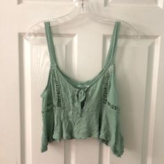 Cute Flowly Crop Top From Urban Outfitters. New Never Worn With Tags On Still. Spring Casual Crop Tank Top, Spring Vacation Crop Tank Top, Urban Outfitters Cotton Tank Top For Summer, Casual Cropped Tank Top For Summer, Casual Cropped Tank Top For Day Out, Green Cropped Tank Top For Summer, Green Cropped Tank Top For Day Out, Urban Outfitters Green Spring Tank Top, Green Urban Outfitters Tank Top For Spring