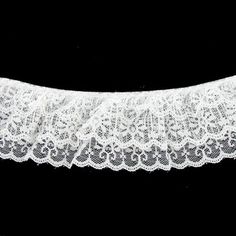 a white lace on a black background