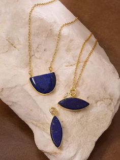 Bohemian Lapis Lazuli pendant necklace in gold plated brass. Suitable for both men and women. Various shapes available. Statement Lapis necklace with adjustable chain length. Durable gold plating, anti-tarnish, non-allergic. Gold Plated Necklaces With Gemstone Round Pendant, Gold Plated Necklaces With Round Gemstone Pendant, Gold Plated Gemstone Round Pendant Necklace, Gold Plated Round Pendant Necklaces With Gemstone, Gold Plated Necklace With Round Gemstone Pendant, Gold Plated Teardrop Gemstone Necklace, Gold Plated Teardrop Pendant Necklace With Gemstone, Gold Plated Natural Stones Pendant Jewelry, Amulet Style Necklace With Oval Pendant Natural Stones