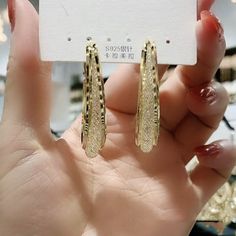 Product Information： Style: Women's Size: about 4.5cm long, about 3cm wide and diameter earrings Material: Alloy / Silver Plated / Gold Plated Inlay material: not inlaid Color: gold, silver needle, silver Packing List： A pair of earrings Silver Metal Hoop Earrings, Plated, Gold Hoop Jewelry Made Of Alloy, Silver Plated Metal Hoop Earrings, Gold Hoop Alloy Jewelry, Gold Hoop Jewelry In Alloy, Gold Hoop Earrings In Alloy, Gold Alloy Hoop Earrings, Trendy Gold Alloy Hoop Earrings, Elegant Gold Alloy Hoop Earrings