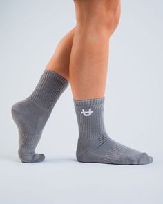 Step in style from the gym to the streets in UPPPER’s Original Grey Crew Socks. Designed to bring comfort to your workout and beyond with cushioning on the sole and ribbed panel for extra arch support, while preventing sweat buildup to keep your feet fresh and cool. So sporty, so on trend. Wear UPPPER Original Grey Socks tall or scrunched with leggings or shorts and your favorite sneakers then you’re ready to conquer your day. This product cannot be returned for hygiene reasons. Features Moisture-wicking to keep feet fresh from the gym to the streets. Breathable to prevent sweat build-up. Cushioned sole for added comfort. Ribbed panel through the middle of the foot for extra arch support. Specifications Color: Grey Pack of three Crew Socks. 43% Bamboo / 42% Cotton / 12% Polyester / 3% Span Sporty Sweat-resistant Socks For Sports, Sporty Socks For Running, Breathable Comfortable Socks For Gym, Sporty Comfortable Running Socks, Comfortable Sporty Socks For Running, Comfortable Sporty Socks For Sports, Breathable Comfortable Gym Socks, Sweat-resistant Comfortable Sports Socks, Sports Stretch Socks Fade-resistant