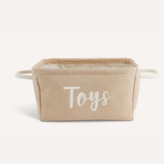 a toy storage bag with the word toys printed on it's front and bottom