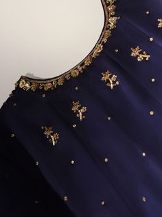 Curated on navy blue pure raw silk 60 gms heavily embellished with intricate gold craftsmanship, styled with a Chooridar pyjama, the whole look comes together with a pure matching organza dupatta with sequins spray. The length of the long pishwas is 50 inches. Order Duration: 4 to 6 weeks Elegant Silk Anarkali Set With Gold Embroidery, Semi-stitched Gold Embroidered Sharara For Party, Semi-stitched Sharara With Gold Embroidery For Party, Party Semi-stitched Sharara With Gold Embroidery, Bollywood Style Gold Embroidered Sharara For Party, Festive Traditional Wear With Gold Embroidery For Party, Gold Traditional Party Wear For Eid, Silk Dupatta With Gold Embroidery For Eid, Silk Sharara With Gold Embroidery For Festive Occasions