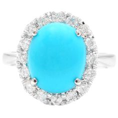 7.65 Carats Impressive Natural Turquoise and Diamond 18K White Gold Ring Suggested Replacement Value $6,000.00 Total Natural Oval Turquoise Weight is: Approx. 7.00 Carats Turquoise Measures: 12.00 x 10.00mm Natural Round Diamonds Weight: Approx. 0.65 Carats (color G-H / Clarity SI1-SI2) Ring size: 6.5 (free re-sizing available) Ring total weight: 5.5 grams Disclaimer: all weights, measurements and colors are approximate and may vary slightly from the listed dimensions or as seen in the image. Al Emerald Cut Aquamarine Ring, Emerald Cut Rings, Diamond Jewelry Designs, Etsy Gold Ring, Peridot Ring, White Gold Ring, London Blue Topaz, Natural Turquoise, Quality Diamonds