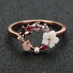 Beautiful. New And Never Worn. Size 5. Fine Jewelry Flower Shaped Rose Gold Rings, Rose Gold Flower Shaped Fine Rings, Rose Gold Flower Ring With Rose Design, Fine Jewelry Rose Gold Flower Ring, Rose Gold Flower Shaped Fine Jewelry Ring, Rose Gold Flower Ring Fine Jewelry, Feminine Rose Gold Jewelry With Flower Decoration, Delicate Rose Gold Jewelry With Flower Decoration, Delicate Rose Gold Flower-shaped Ring