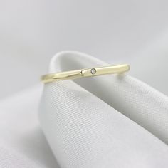 "A Perfect stacking Diamond bar ring set with a single diamond in 14K or 18K gold. A ring that is both Dainty and elegant, Simple and unique. Handmade by an inspired jewelry artist team with decades of experience in the craft of jewelry making. Each gemstone, each diamond is carefully picked. Using only the finest raw materials and the highest industry standard in manufacturing, design and finish. A beautiful vintage inspired piece handmade just for you. Ring Features: - Single Diamond 1.25 mm, Minimalist Stackable Diamond Ring For Formal Occasions, Timeless 14k Gold Stackable Ring With Single Diamond, Gold Stackable Rings With Single Diamond, Timeless Gold Stackable Rings With Diamond, Timeless Gold Stackable Rings With Single Diamond, Minimalist Stackable Rings With Diamond Accents, Minimalist Single Cut Diamond Ring For Anniversary, Minimalist 14k Gold Wedding Ring With Diamond Accents, Minimalist Diamond Ring With Accents