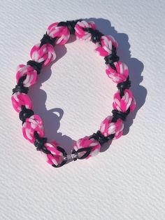 black pink and white rainbow loom bracelet made of bands Rainbow Loom Bracelet, Rainbow Looms, Rainbow Loom Bracelets, Stylish Hoodies, Loom Bracelet, Rainbow Loom, Loom Bracelets, White Rainbow, Pink Bracelet