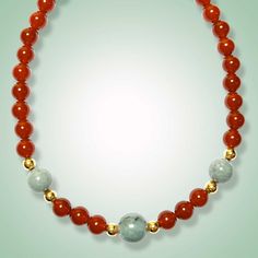 Crafted with vibrant carnelian and mint green jade, this necklace is a stunning addition to any jewelry collection. Both stones are known for their healing properties and are believed to bring good luck and prosperity to the wearer. Mint green jade (16 and 18mm) Carnelian Goldfilled Length: 20 inches Traditional Jade Necklace With Gemstone Beads, Spiritual Red Jade Jewelry, Red Jade Gemstone Jewelry, Jade Necklace With Round Gemstone Beads, Jade Bead Necklaces For Meditation, Jade Gemstone Amulet Necklaces, Jade Amulet Necklaces With Gemstones, Spiritual Round Jade Beaded Necklaces, Jade Gemstone Amulet Necklace